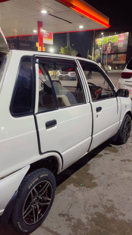 mehran-2003-model-white-color-biometric-available-big-0