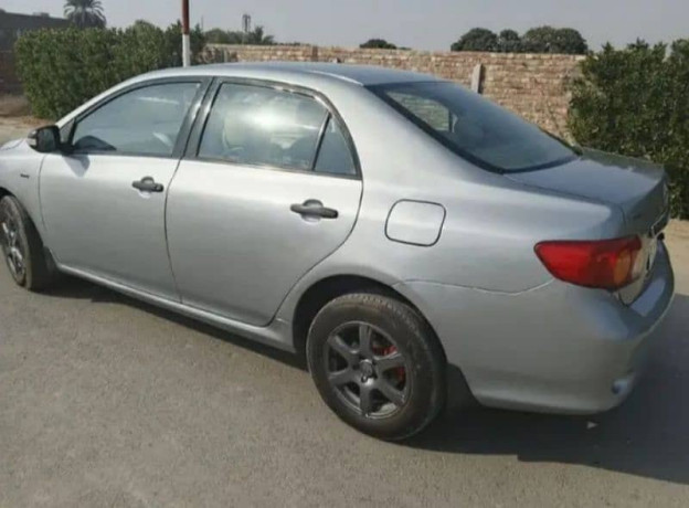 toyota-corolla-gli-2011-big-5