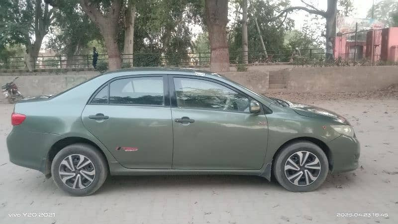toyota-corolla-gli-2011-13-big-4