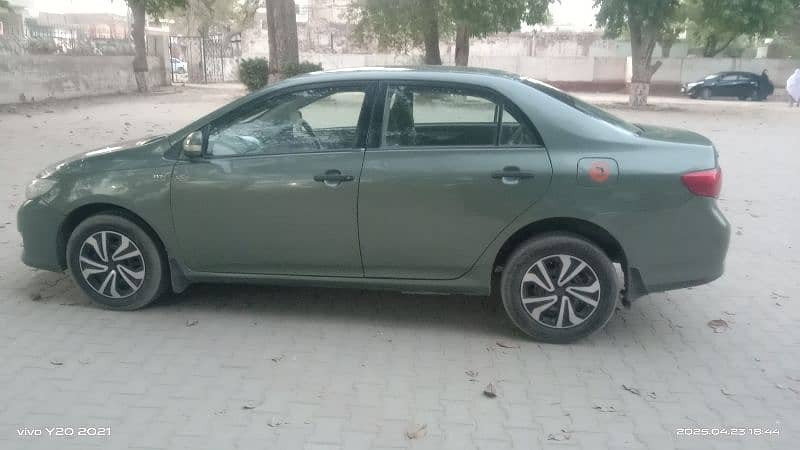 toyota-corolla-gli-2011-13-big-6
