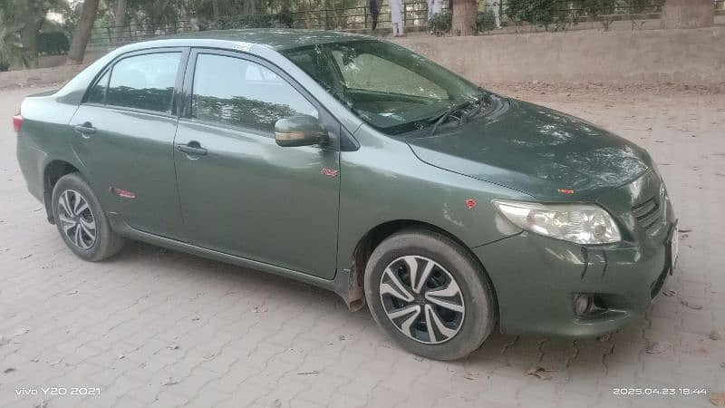 toyota-corolla-gli-2011-13-big-9