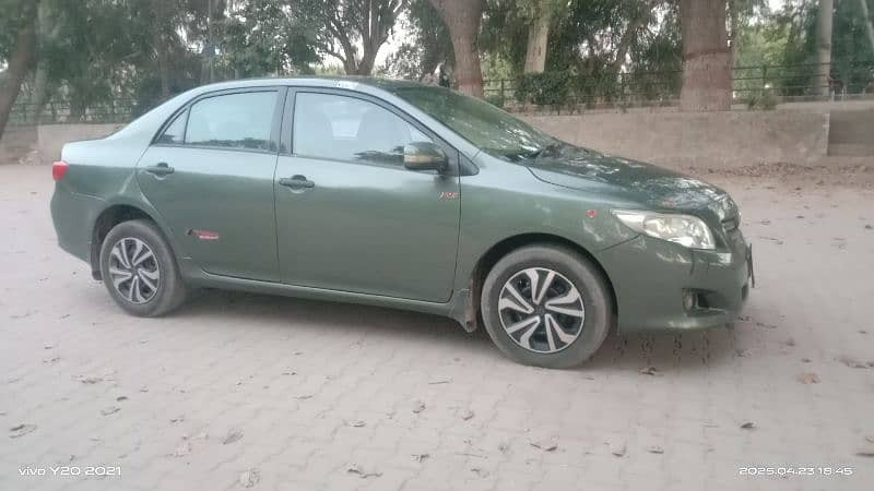 toyota-corolla-gli-2011-13-big-3