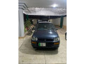 daihatsu-cuore-2004-small-0