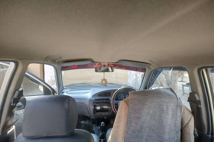 daihatsu-cuore-2011-big-4