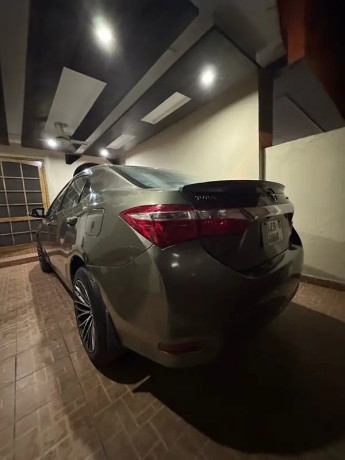 toyota-corolla-altis-grande-x-cvt-i-18-beige-interior-big-3