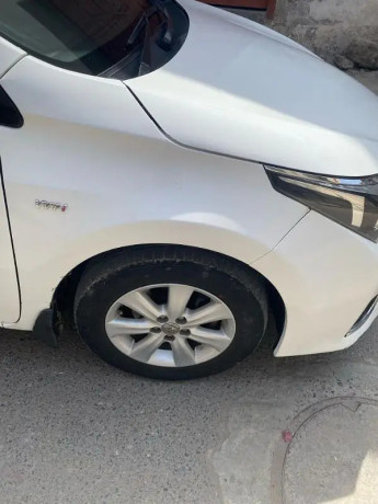 toyota-corolla-altis-grande-x-cvt-i-18-beige-interior-big-3