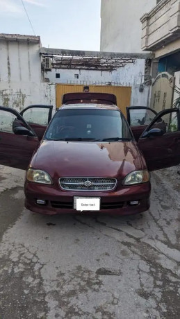 suzuki-baleno-2004-big-0