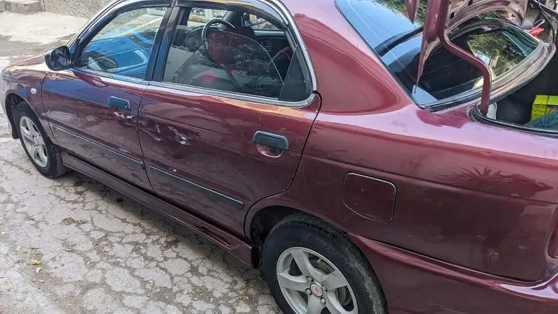 suzuki-baleno-2004-big-3