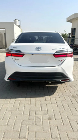 toyota-corolla-altis-grande-x-cvt-i-18-black-interior-big-3