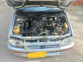 daihatsu-cuore-2011-small-11