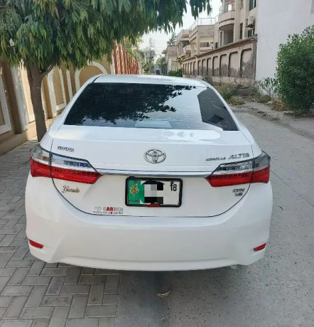 toyota-corolla-altis-grande-x-cvt-i-18-beige-interior-big-0
