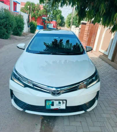 toyota-corolla-altis-grande-x-cvt-i-18-beige-interior-big-1