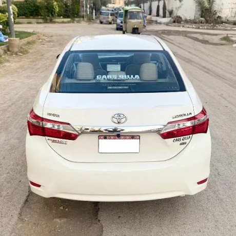 toyota-corolla-gli-2017automatic-white-big-13