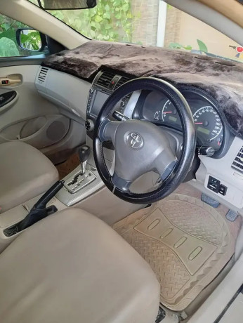 toyota-corolla-gli-16-vvt-i-automatic-ha-2011-model-big-2