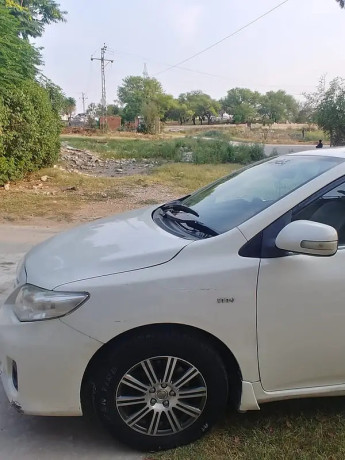 toyota-corolla-gli-13-vvti-2013-big-9