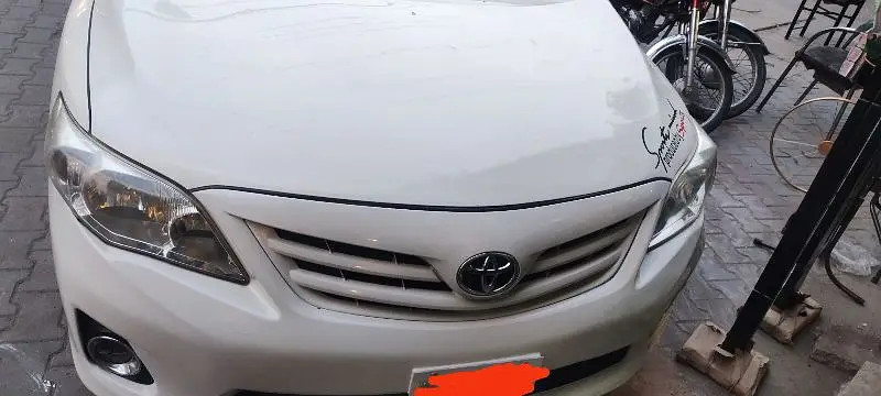toyota-corolla-gli-2012-big-8