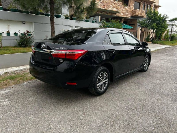 toyota-corolla-altis-grande-x-cvt-i-18-black-interior-big-1