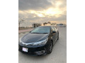 toyota-corolla-altis-grande-x-cvt-i-18-black-interior-small-1