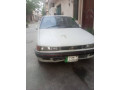 mitsubishi-lancer-1990-small-0