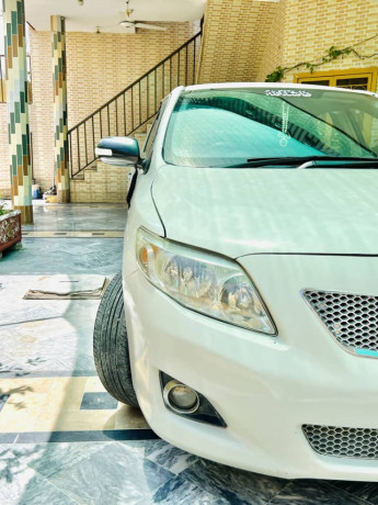 toyota-corolla-xli-2011-big-7