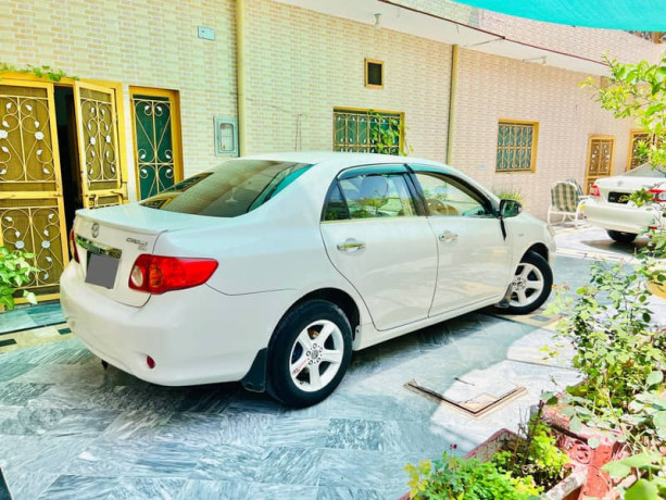 toyota-corolla-xli-2011-big-3
