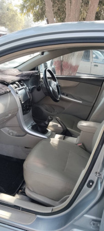 toyota-corolla-gli-2011-big-3