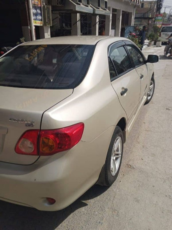 toyota-corolla-gli-2009-00966595331348-big-3