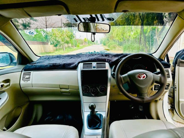toyota-corolla-xli-2009-gli-convert-big-9