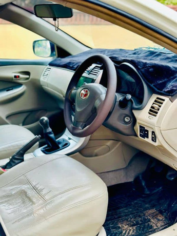 toyota-corolla-xli-2009-gli-convert-big-4