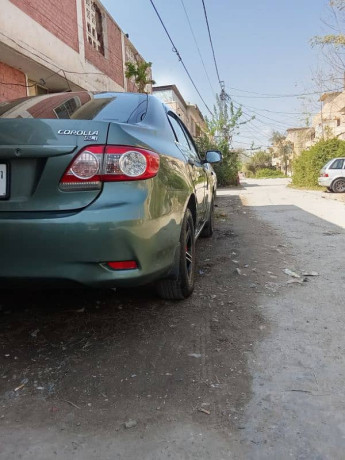 toyota-corolla-gli-2011-big-5