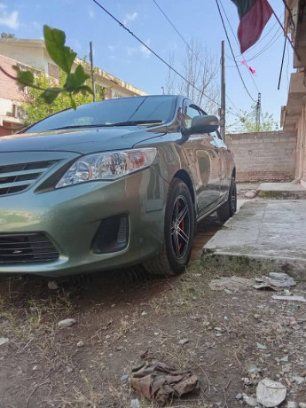 toyota-corolla-gli-2011-big-3