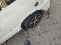 daihatsu-cuore-2004-small-2