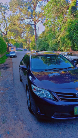 toyota-corolla-gli-2013-contact-03315738446-big-3