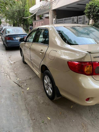 toyota-corolla-gli-2011-big-3