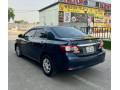 toyota-corolla-gli-2010-face-uplifted-small-4