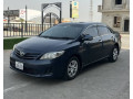 toyota-corolla-gli-2010-face-uplifted-small-11