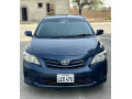 toyota-corolla-gli-2010-face-uplifted-small-12