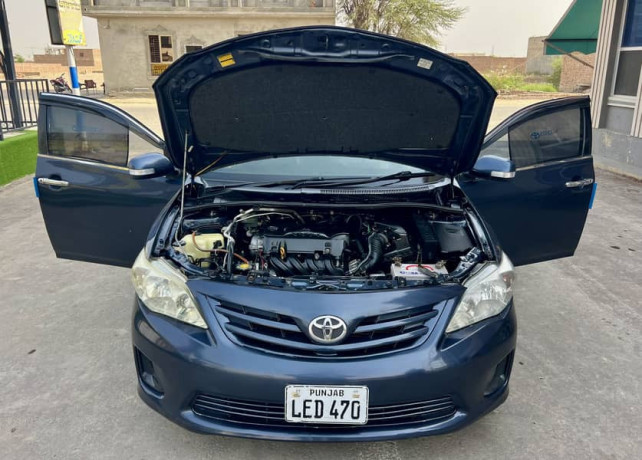 toyota-corolla-gli-2010-face-uplifted-big-13
