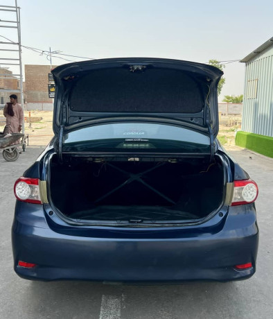toyota-corolla-gli-2010-face-uplifted-big-10