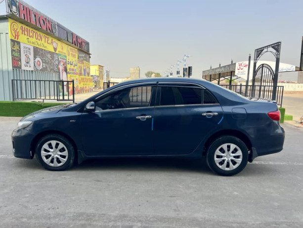 toyota-corolla-gli-2010-face-uplifted-big-2