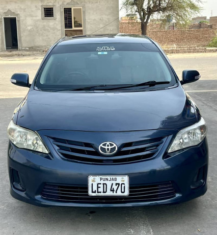 toyota-corolla-gli-2010-face-uplifted-big-12