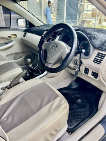 toyota-corolla-gli-2010-face-uplifted-big-7