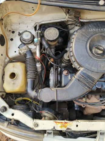 daihatsu-cuore-2006-good-condition-big-6