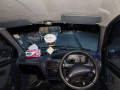 daihatsu-cuore-2010-small-9