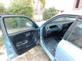 suzuki-baleno-2004-mid-small-4